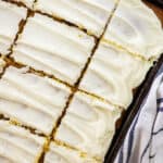 pumpkin bars topped with cream cheese frosting.
