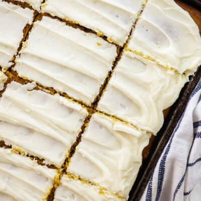 pumpkin bars topped with cream cheese frosting.