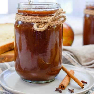 slow cooker apple butter in jar.