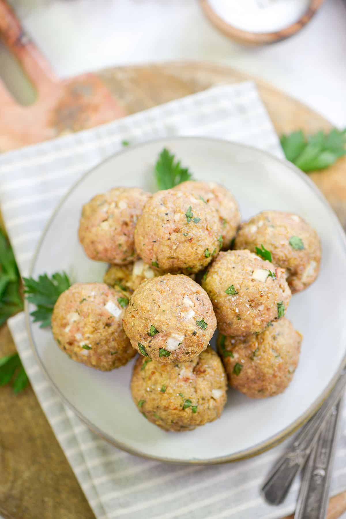 overhead view of turkey meatballs on plate.