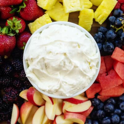 fruit dip with marshmallow fluff surrounded by fresh fruits.