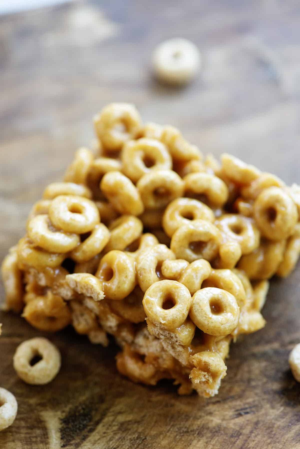 peanut butter cereal bar on wooden board.