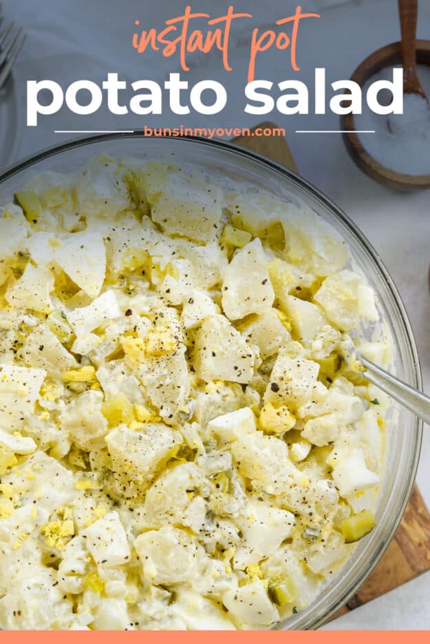 potato salad in glass bowl with text for Pinterest.