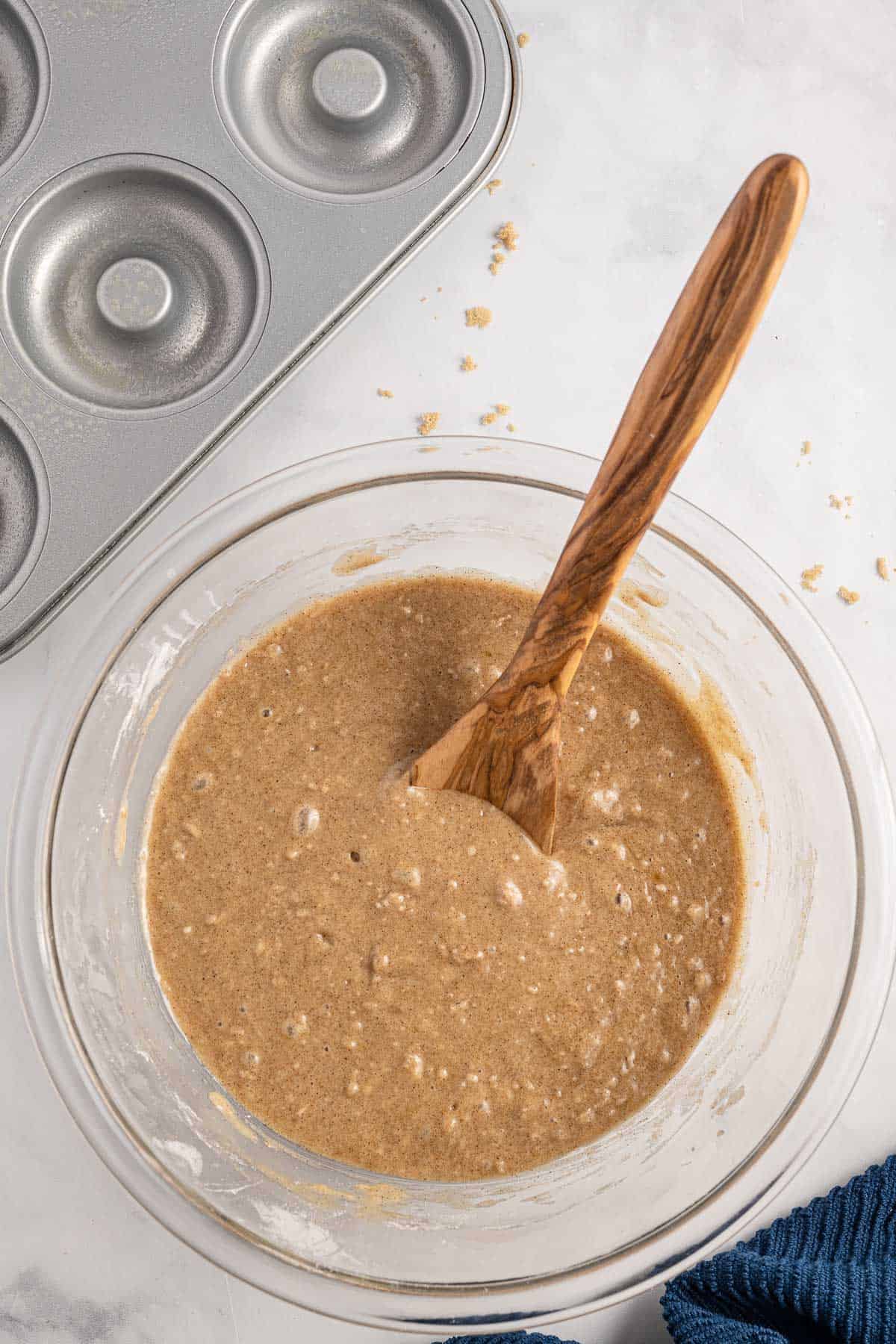 donut ingredients combined in mixing bowl.