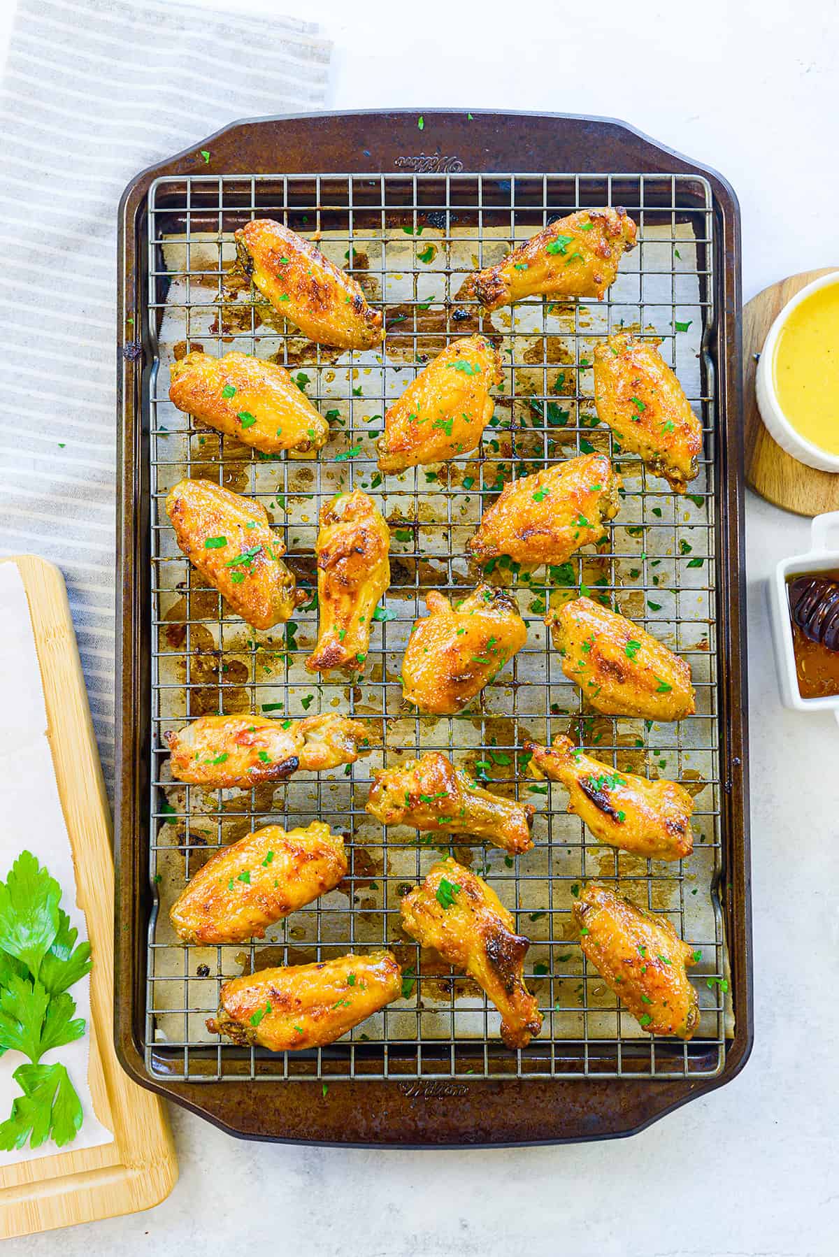 Honey mustard wings on baking sheet.