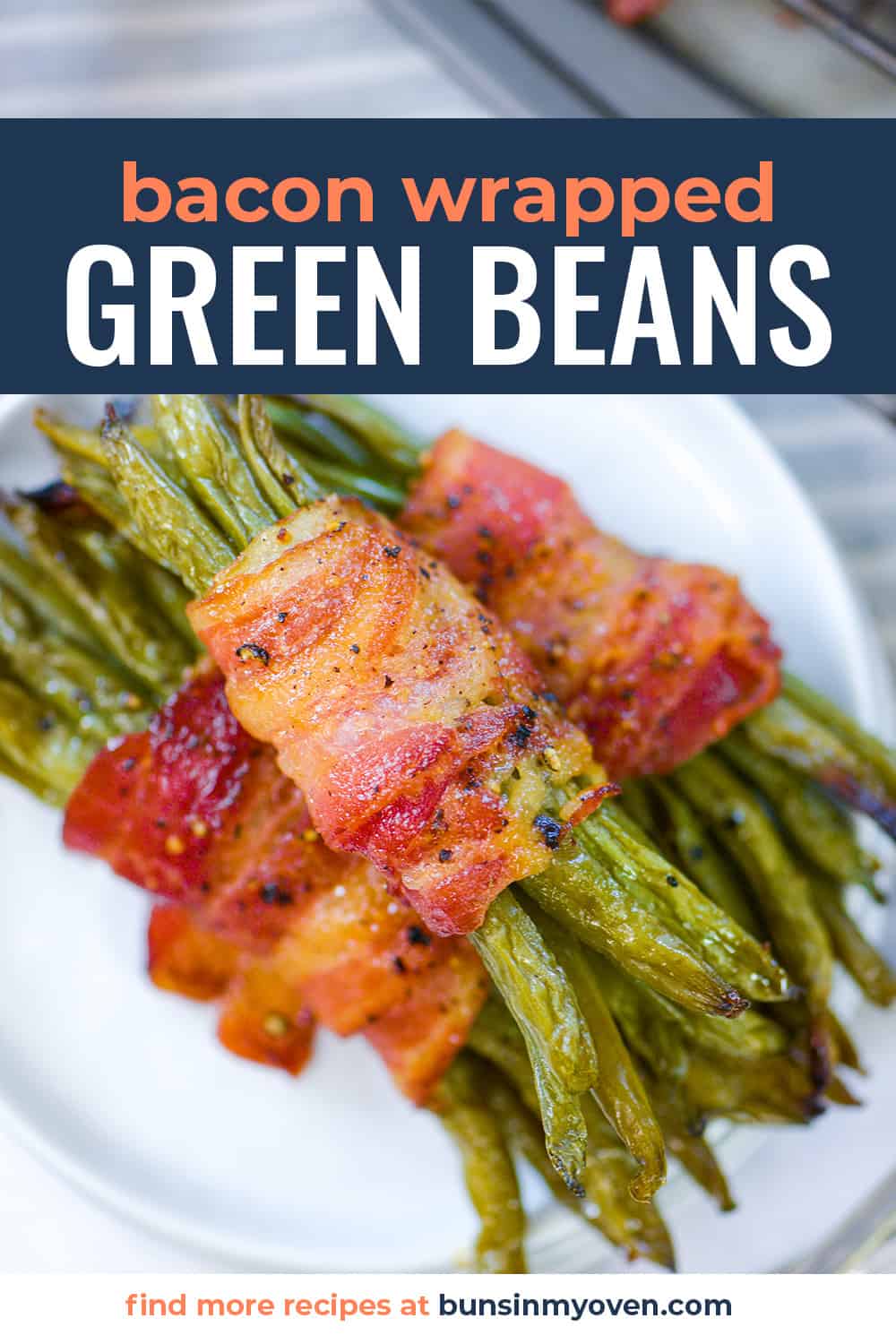 White plate topped with bacon wrapped green bean bundles.