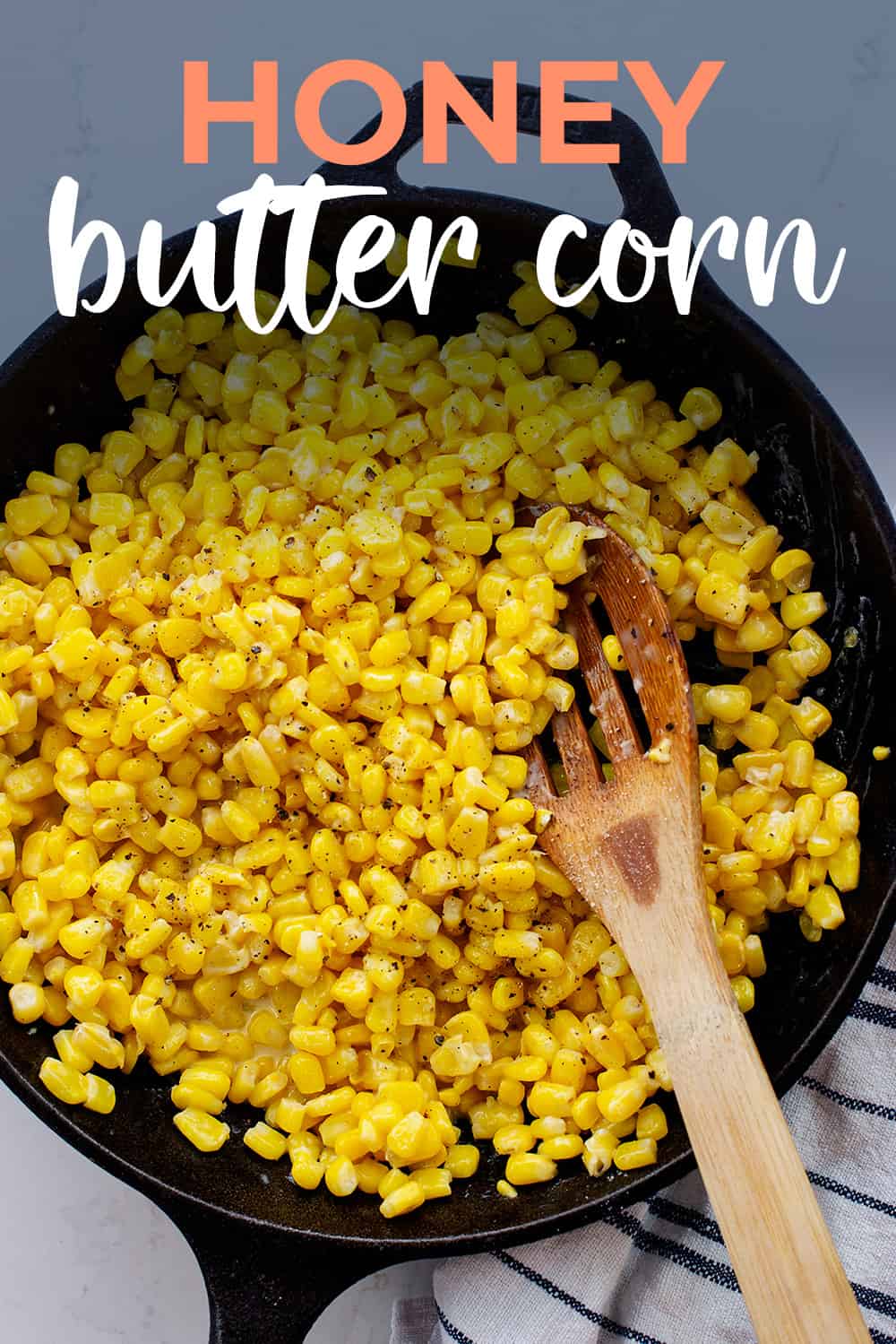 Overhead view of honey butter corn in cast iron skillet.