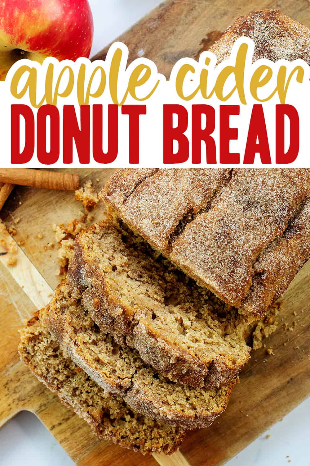 overhead view of sliced apple cider bread on cutting board.