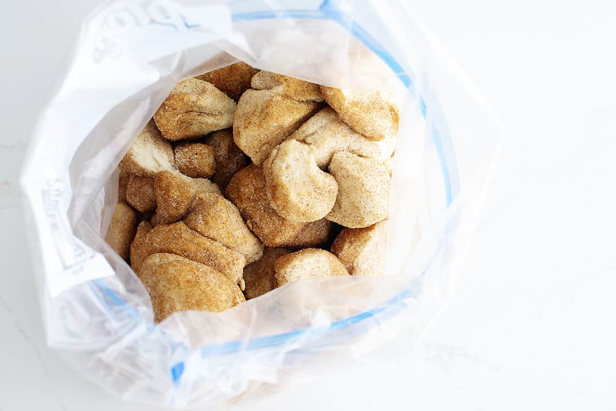 Biscuit pieces in ziptop bag with sugar.