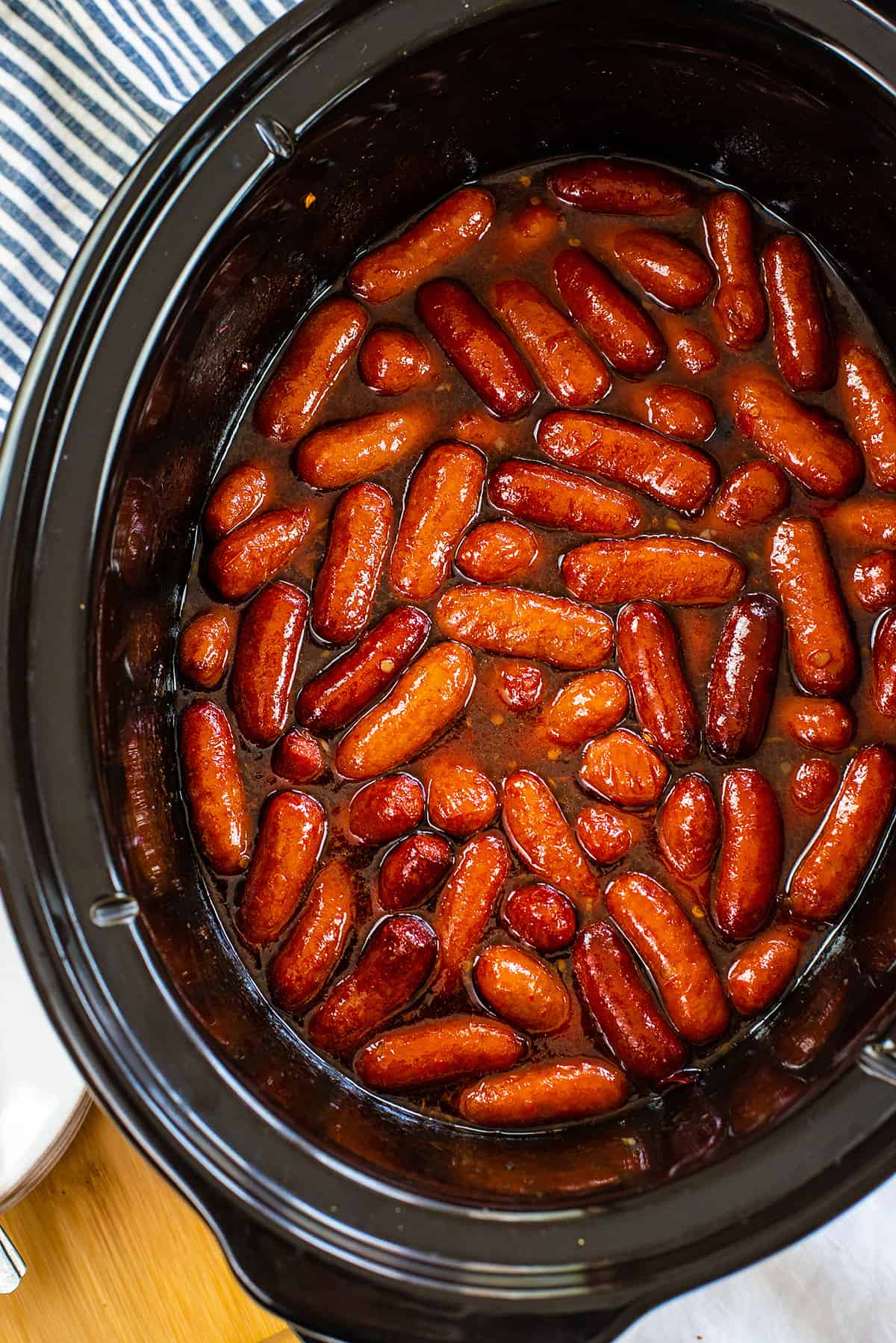 Grape jelly lil smokies in crockpot.