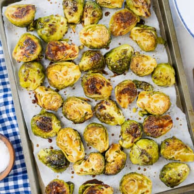 Honey balsamic roasted Brussels sprouts on sheet pan.