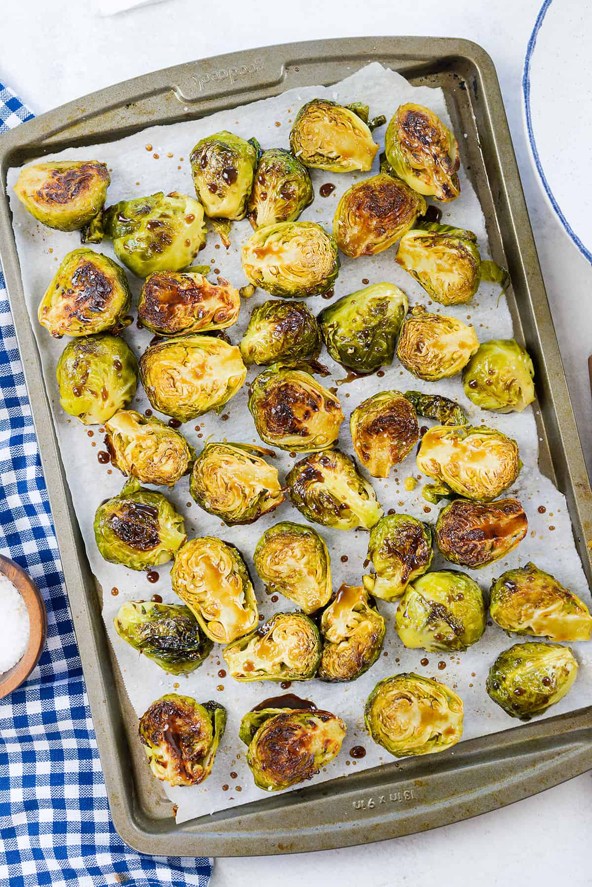 Honey balsamic roasted Brussels sprouts on sheet pan.