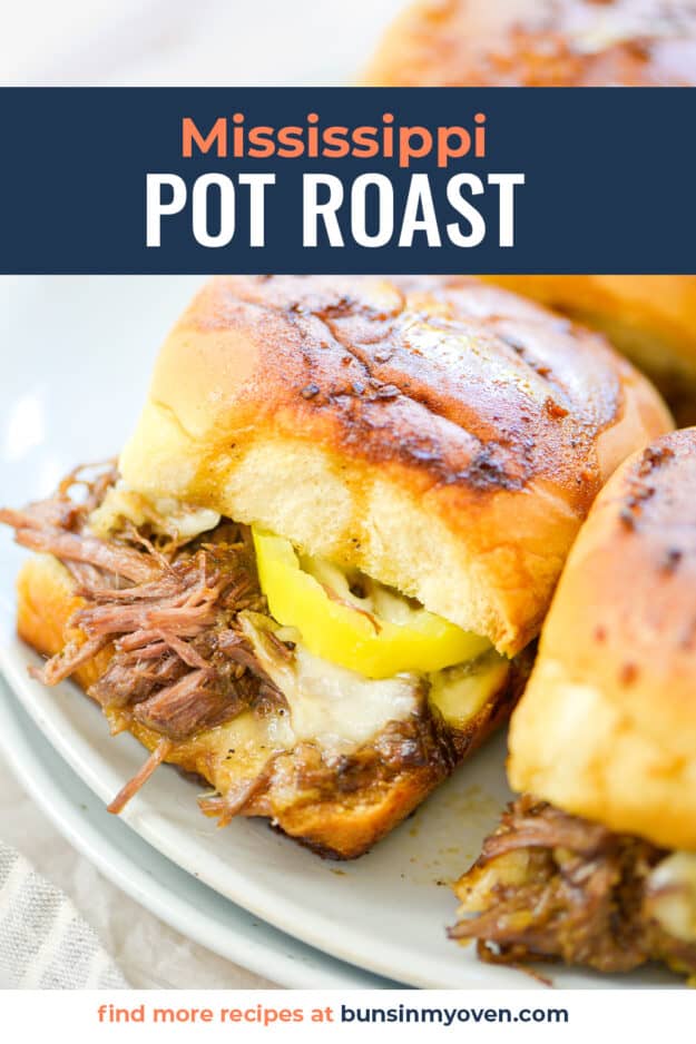 Pot roast slider on white plate.