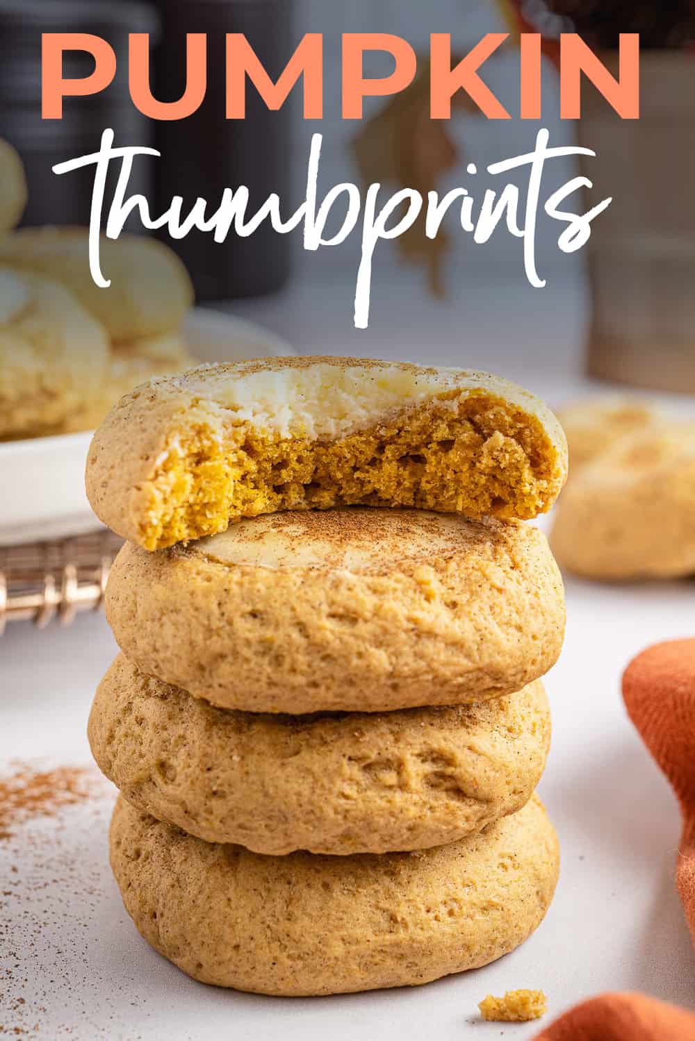 Stack of pumpkin thumbprints on counter.