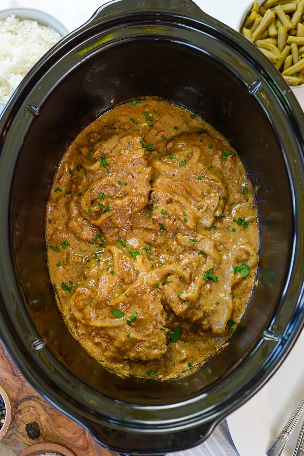 Cube steak and gravy in crockpot.