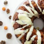 Overhead view of pumpkin monkey bread on cake plate.