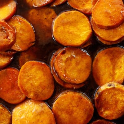 Candied sweet potatoes layered together.