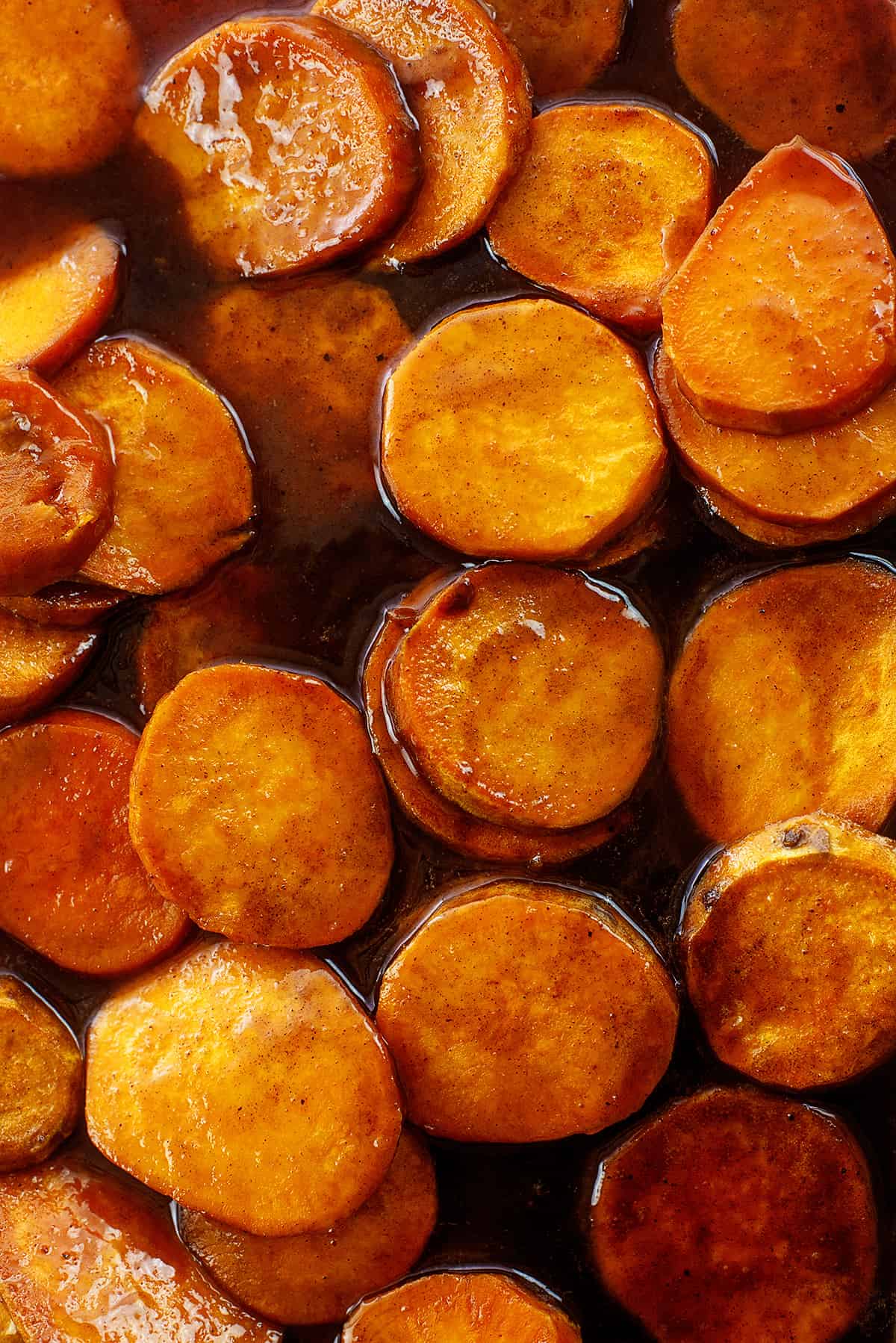 Candied sweet potatoes layered together.