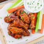 Wings on cutting board.