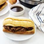French dip sandwich on plate.