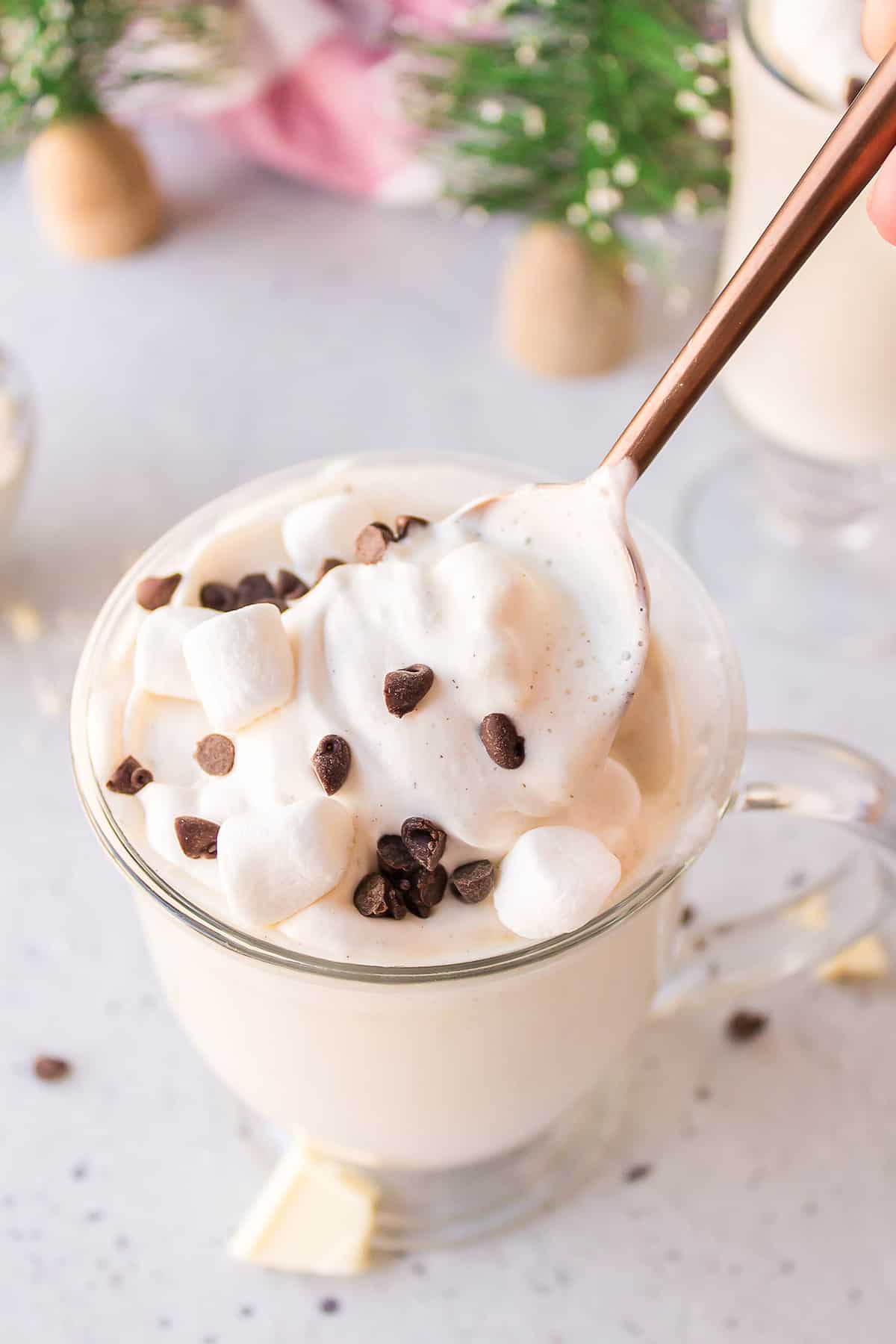 Creamy white hot chocolate in mug.
