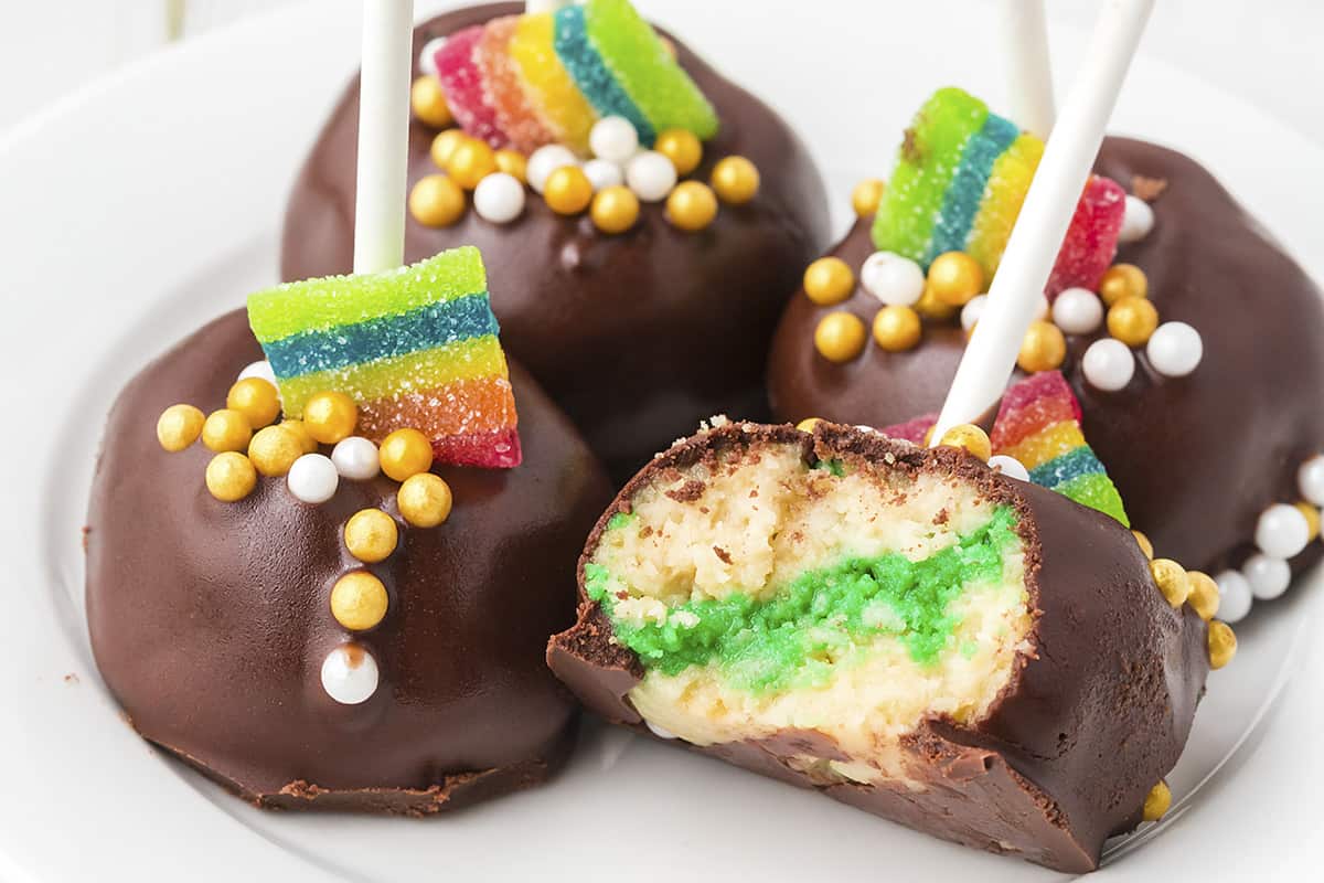 Oreo pops on white plate.