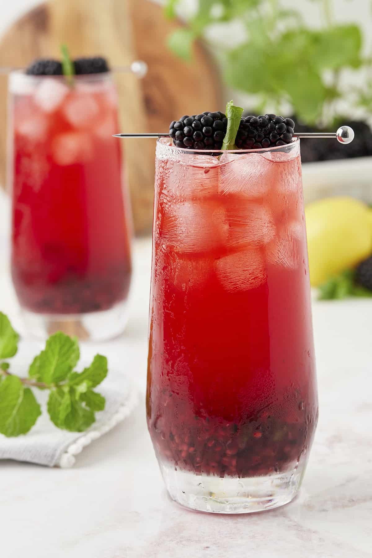 Blackberry mojito recipe in highball glasses.