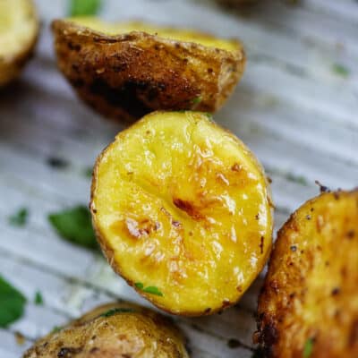 Roasted green potatoes on sheet pan.