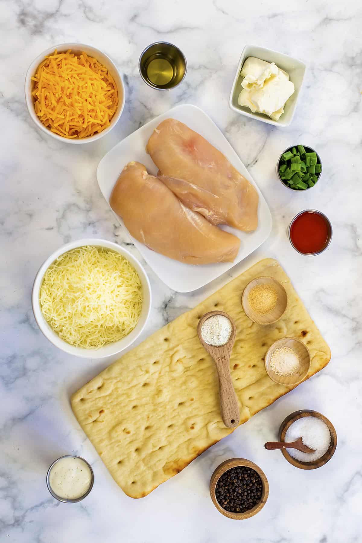 Ingredients for buffalo chicken flatbread.