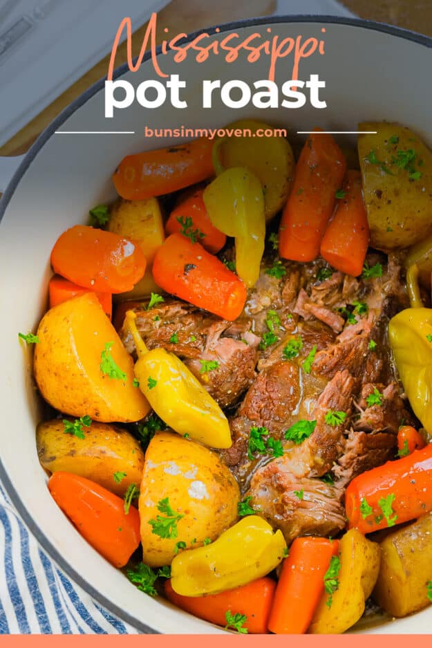 Pot roast in white dutch oven with vegetables.