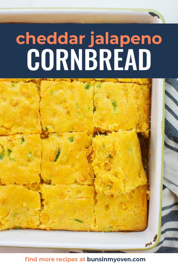 Overhead view of cornbread in white baking dish.