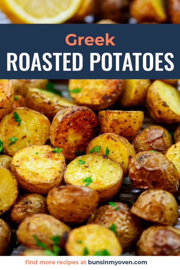 Roasted potatoes piled on sheet pan.