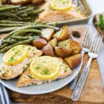 Salmon and vegetables on plate.