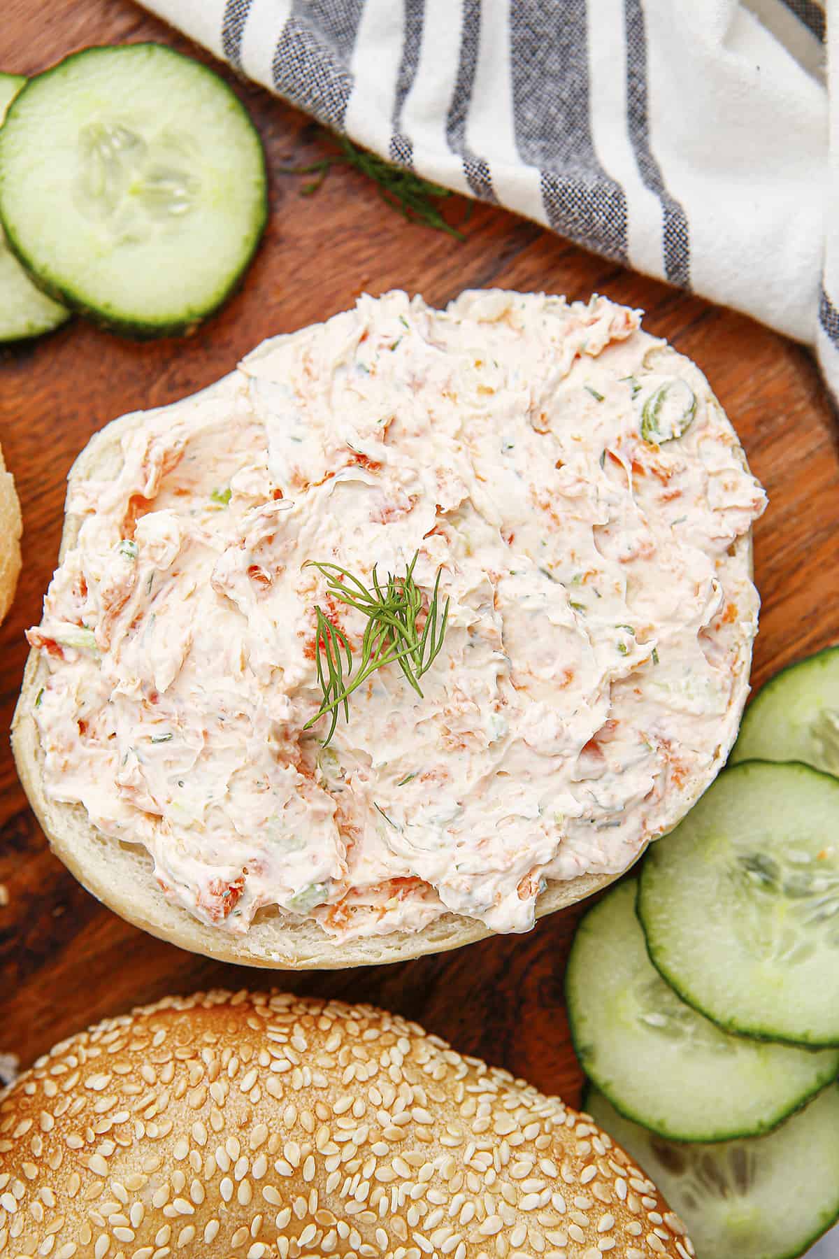 Bagel spread with cream cheese mixed with smoked salmon.