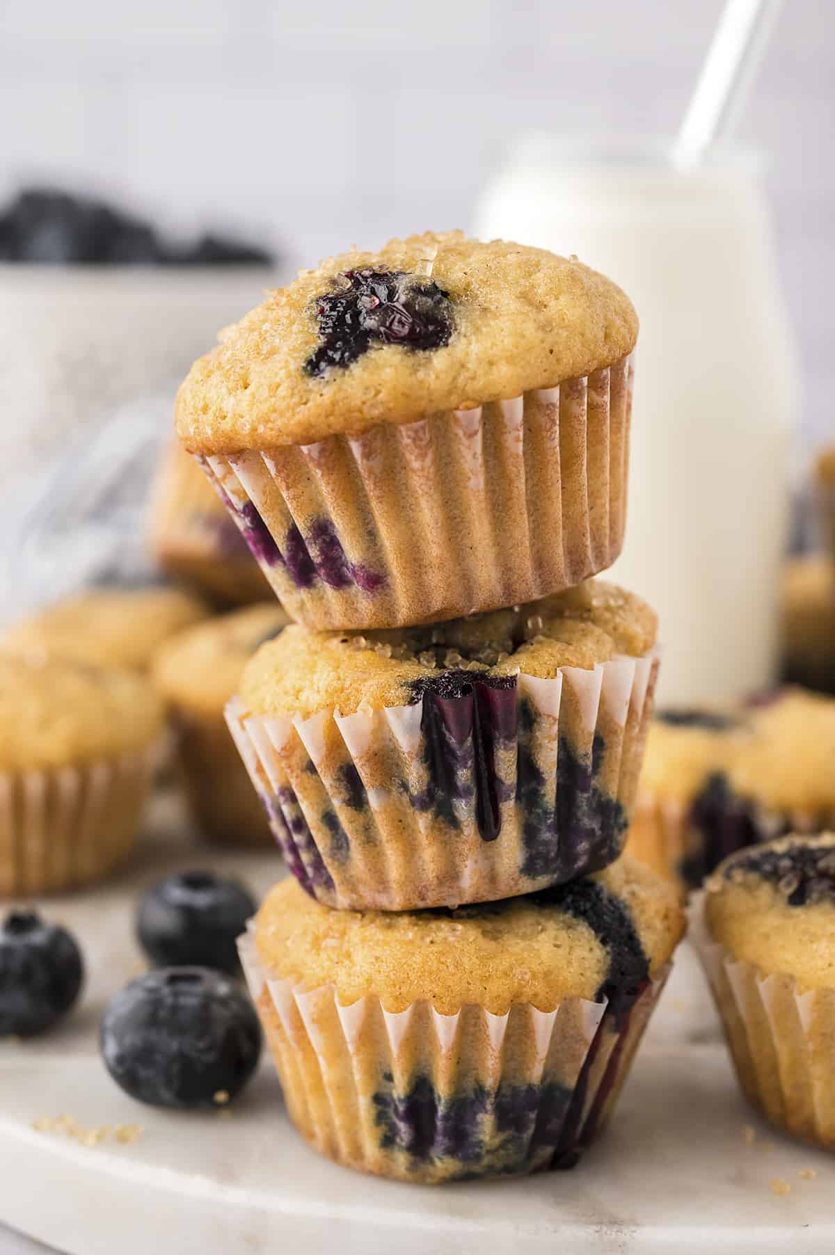 Stack of mini blueberry muffins.