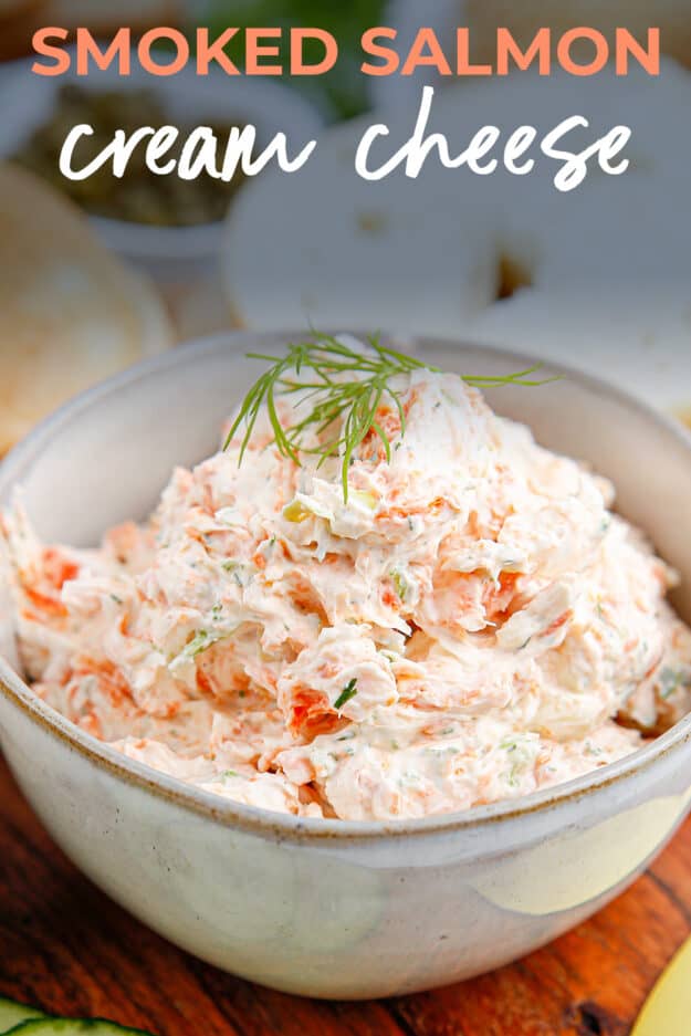 Cream cheese mixed with salmon in bowl.