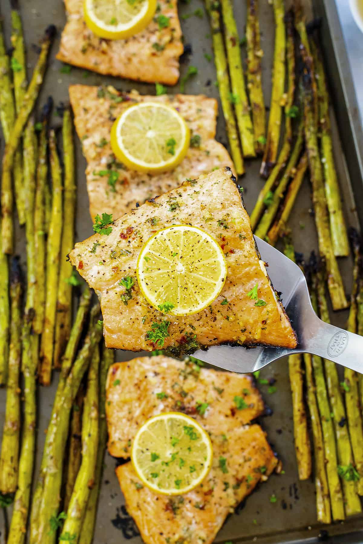 Baked salmon and asparagus on sheet pan.