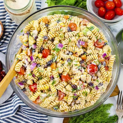 Southwestern pasta salad in glass mixing bowl.