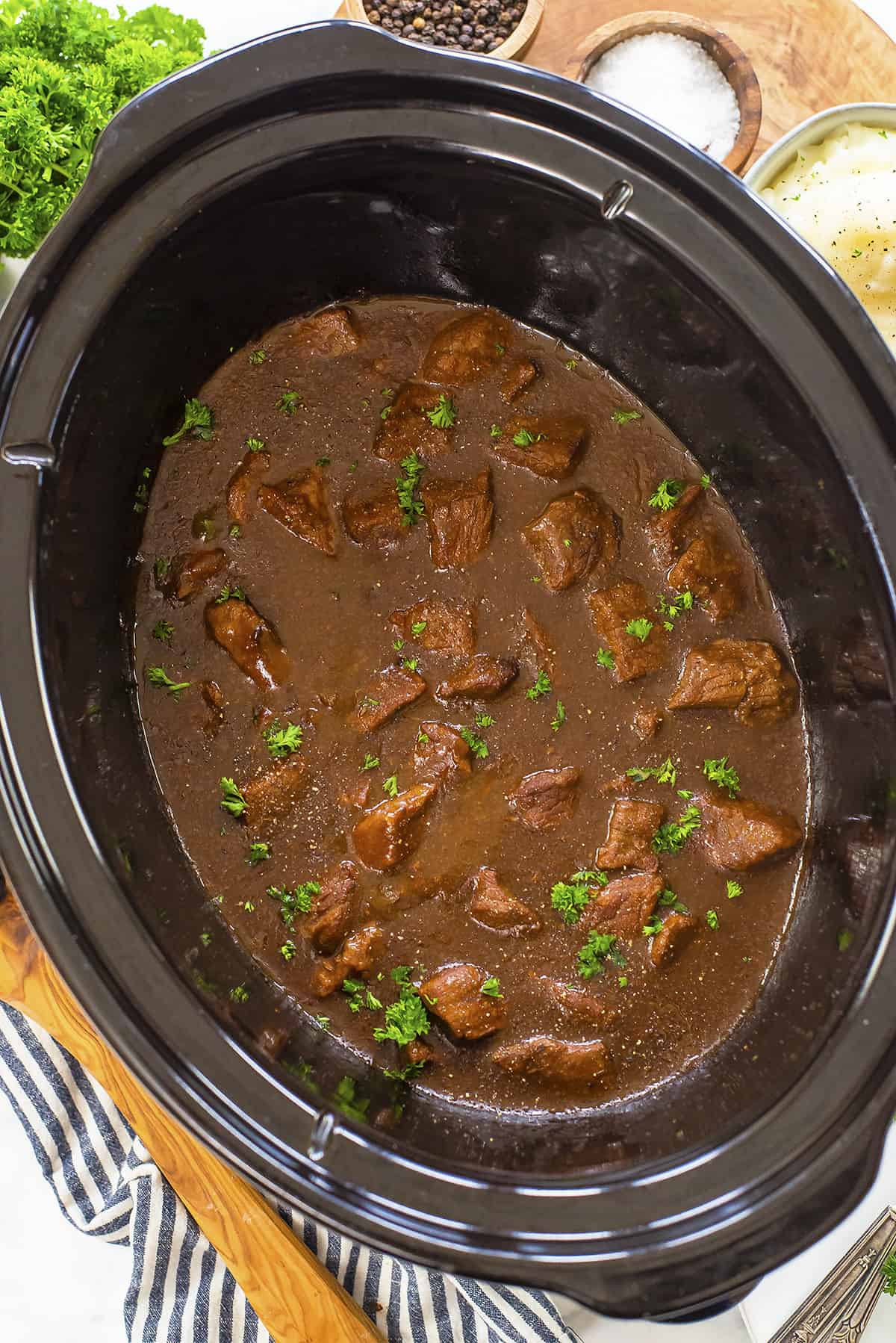 Beef tips and gravy in crockpot.
