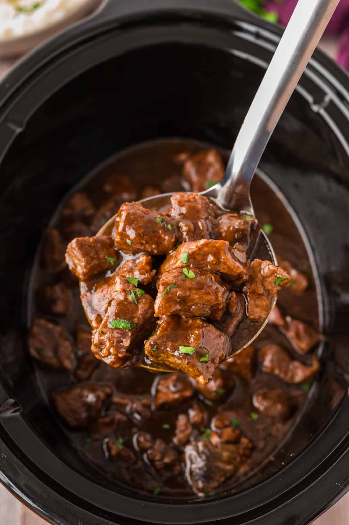 Beef tips and gravy in crockpot.