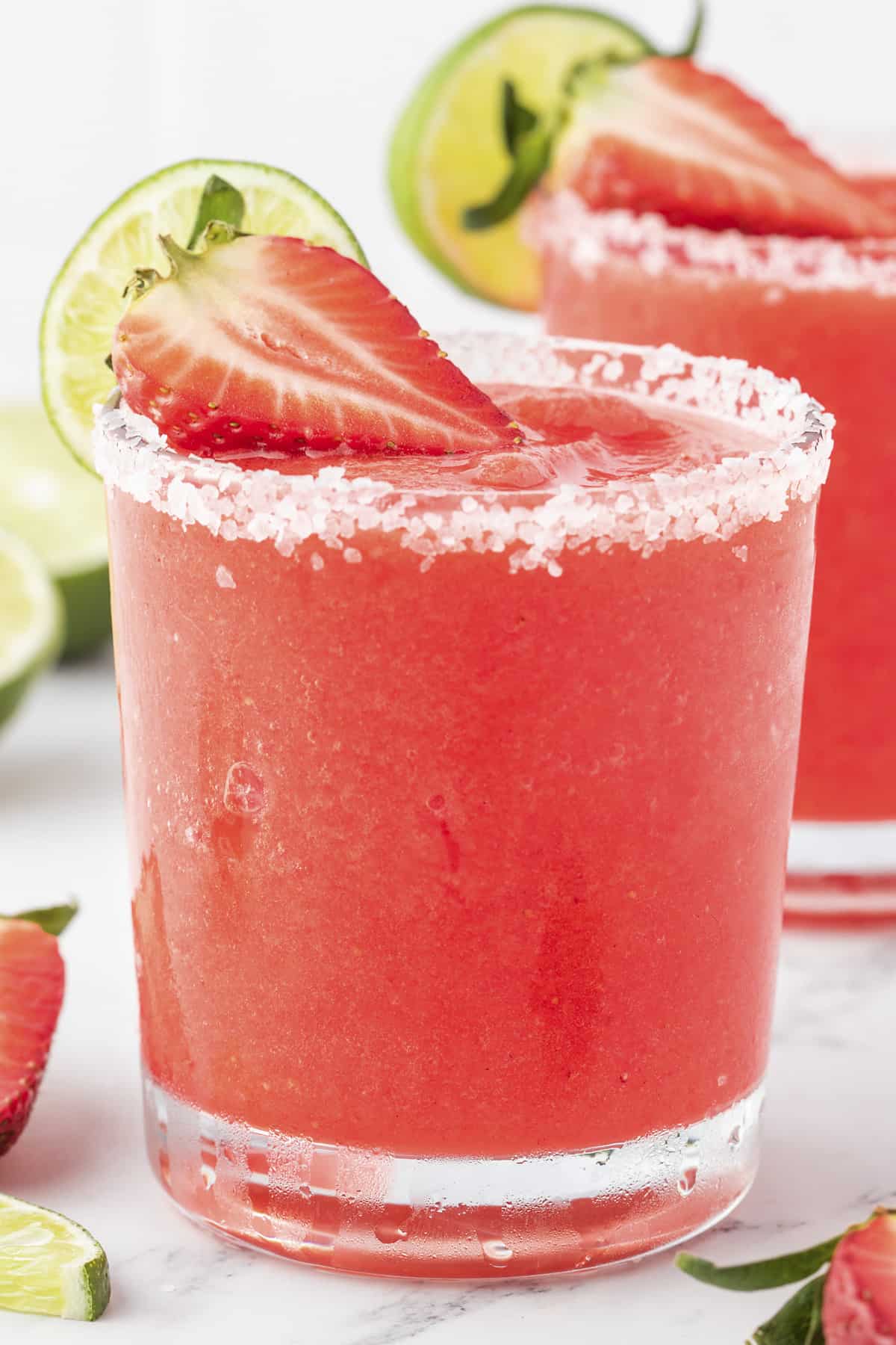 Frozen strawberry margarita in glass.