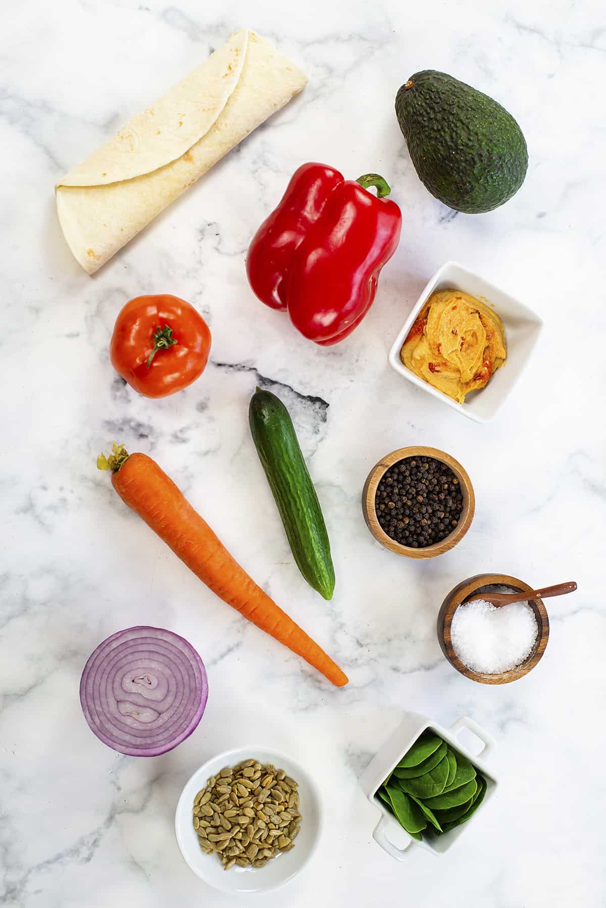 Ingredients for hummus veggie wraps.