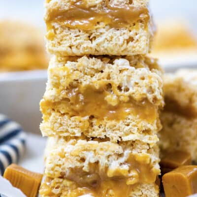 Stack of caramel rice krispies treats on plate.