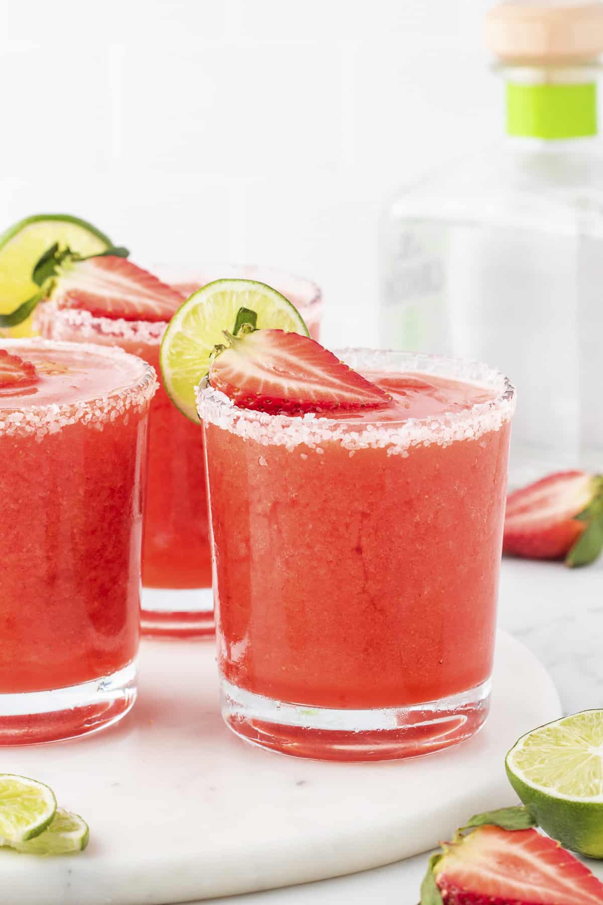 3 glasses of strawberry margaritas.