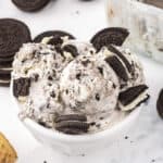 Cookies and cream ice cream in white bowl.