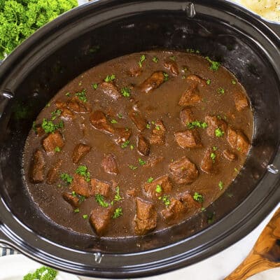 Beef tips and gravy in slow cooker.