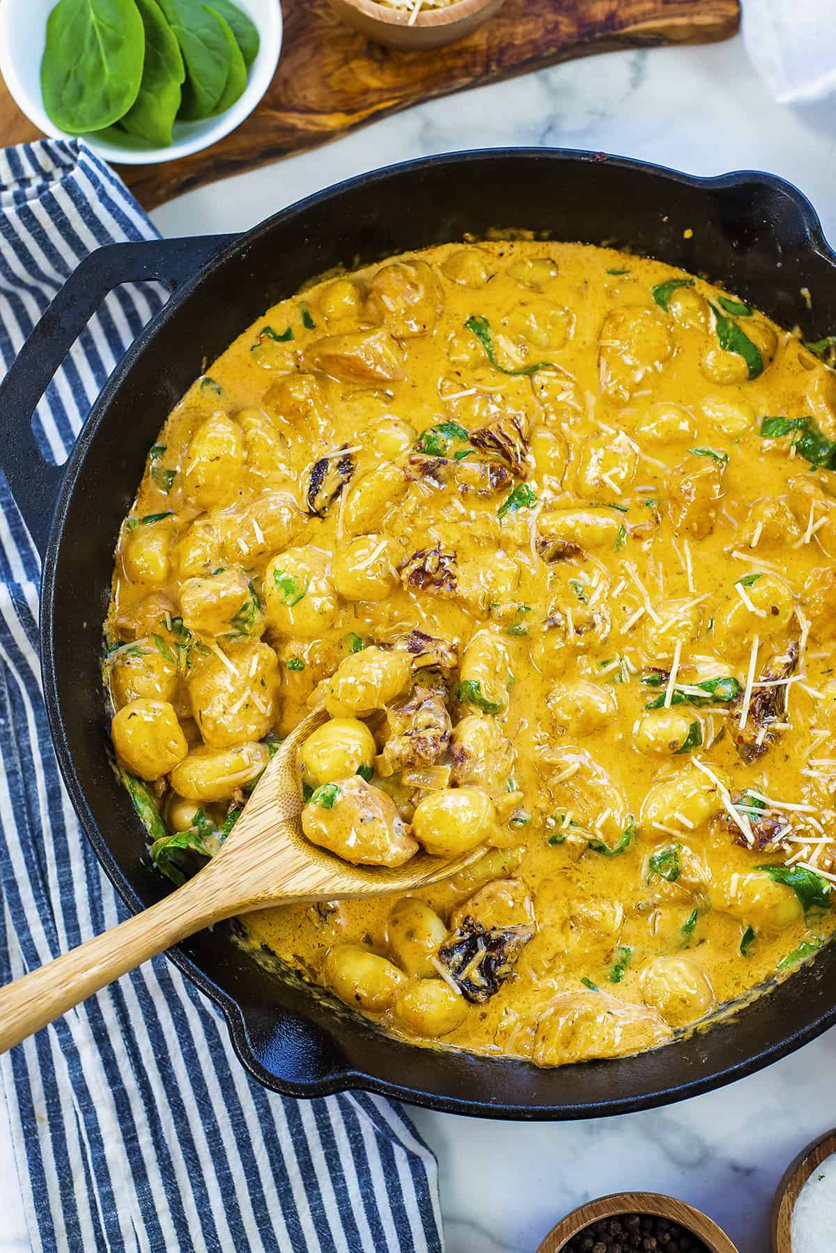 Overhead view of pan full of chicken and gnocchi recipe.