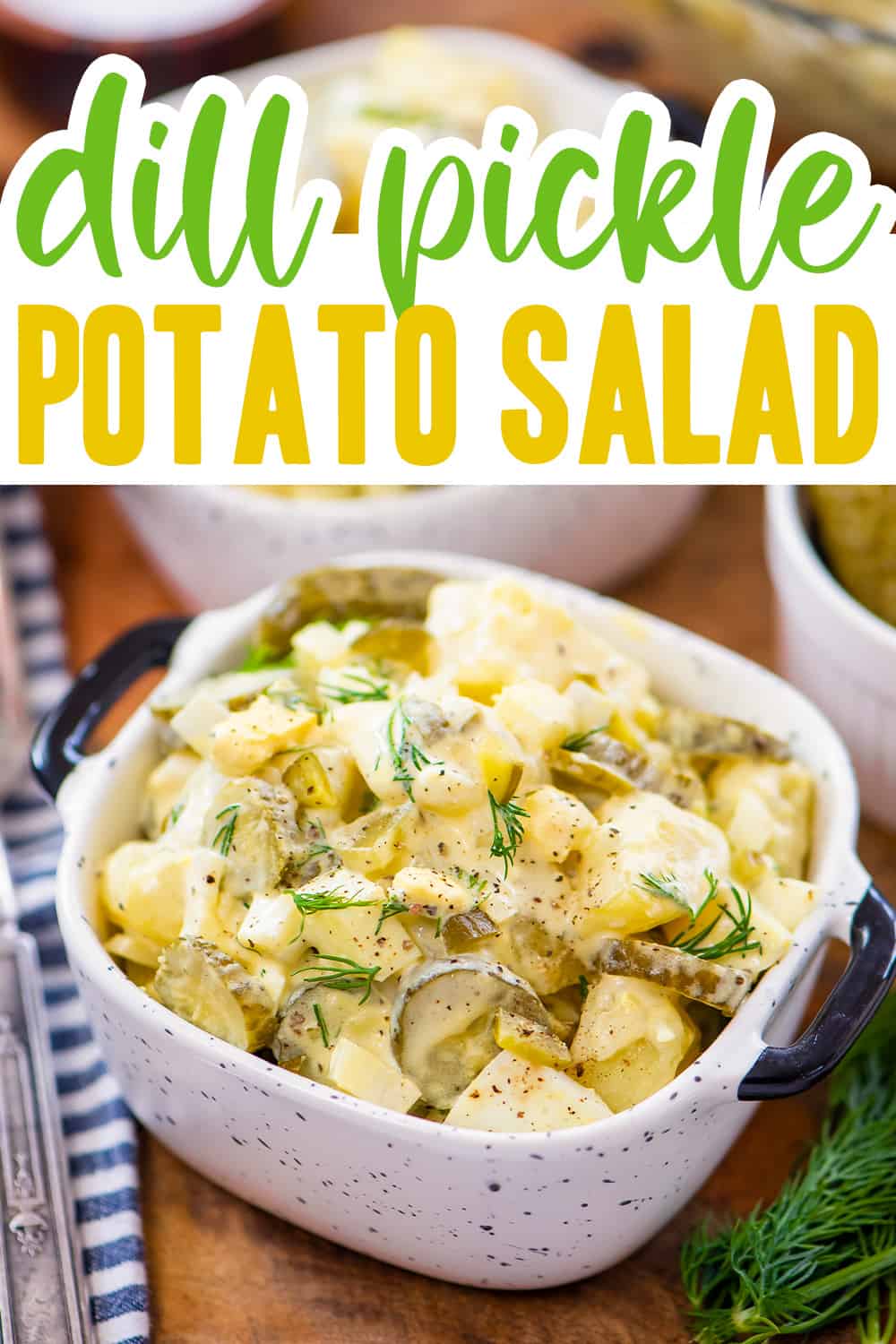Potato salad with pickles in small dish.