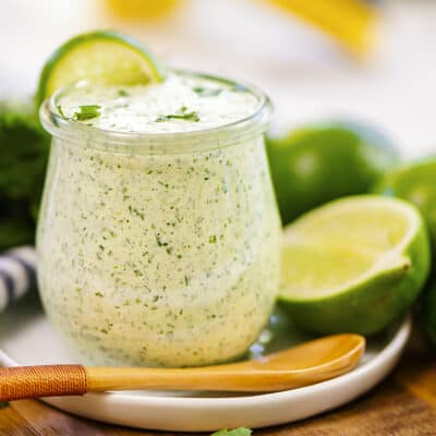 Homemade salad dressing in small jar.