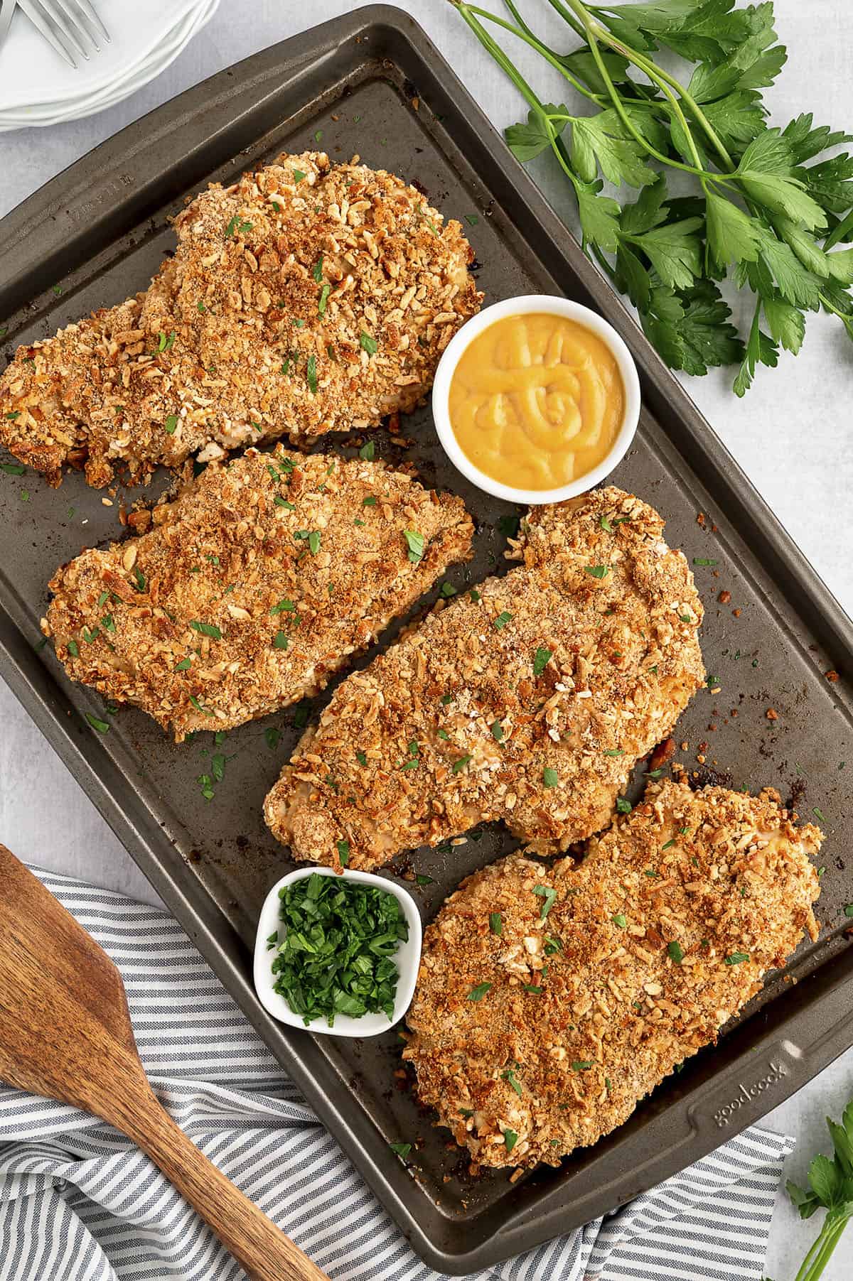 Baked pretzel crusted chicken on sheet pan.